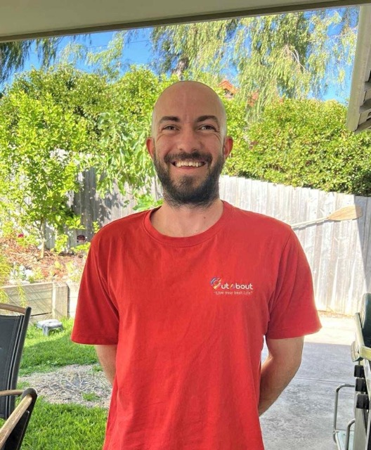 Image of our team member smiling to the camera